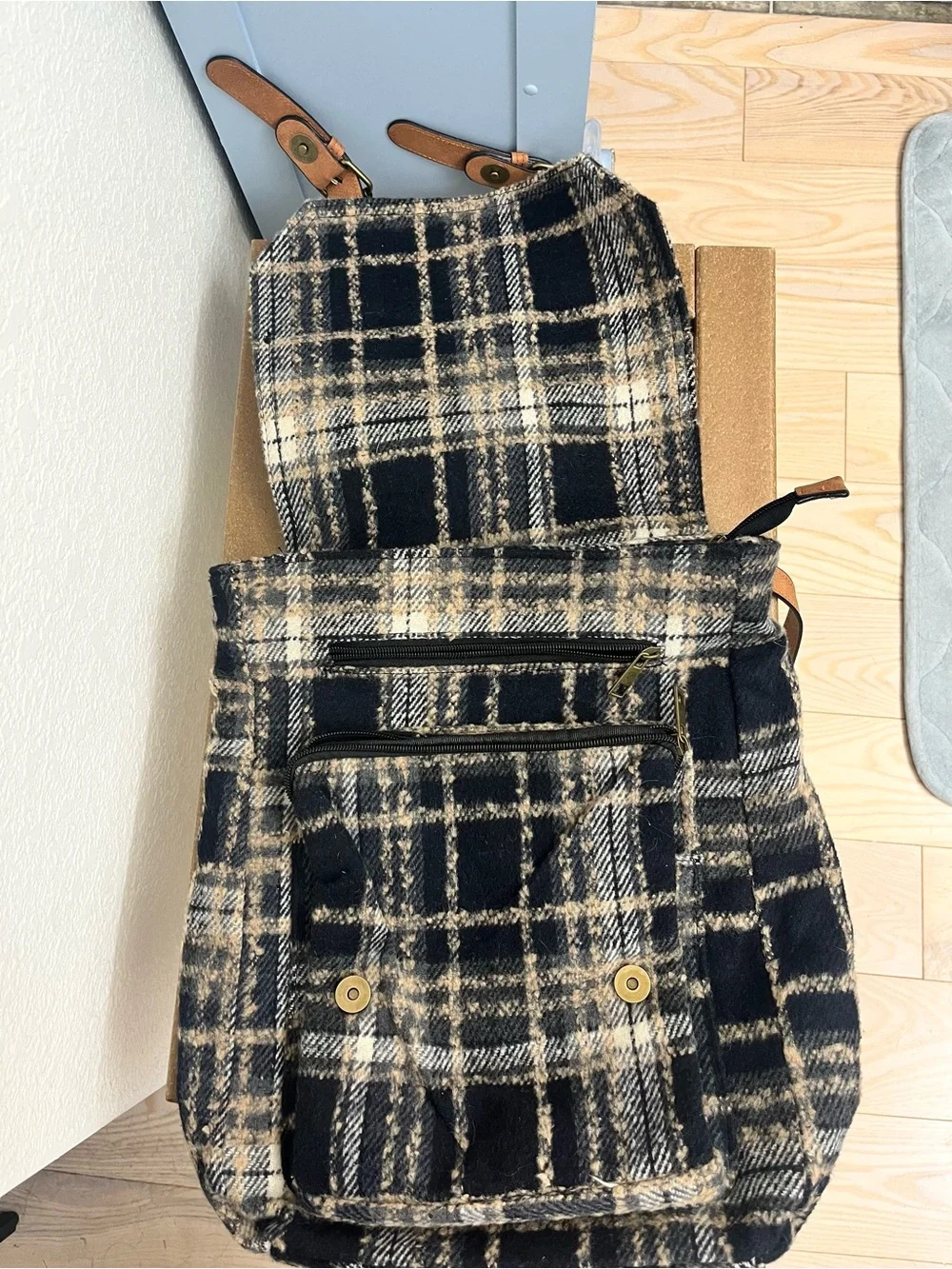 Natural Reflections black and beige plaid backpack